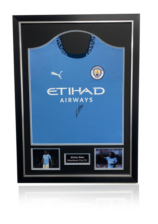 Jeremy Doku Manchester City 2024/25 signed framed shirt
