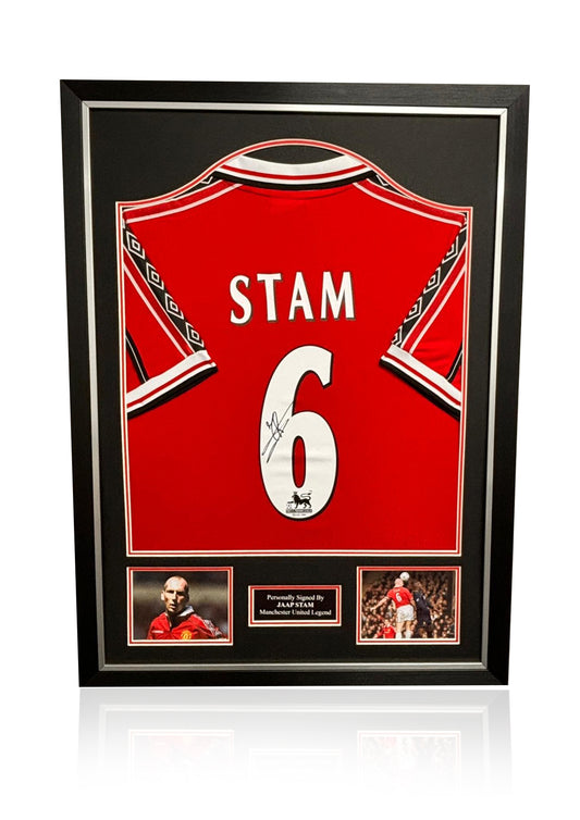 Jaap Stam signed framed 1999 treble winning home kit Manchester United shirt sleeves on show