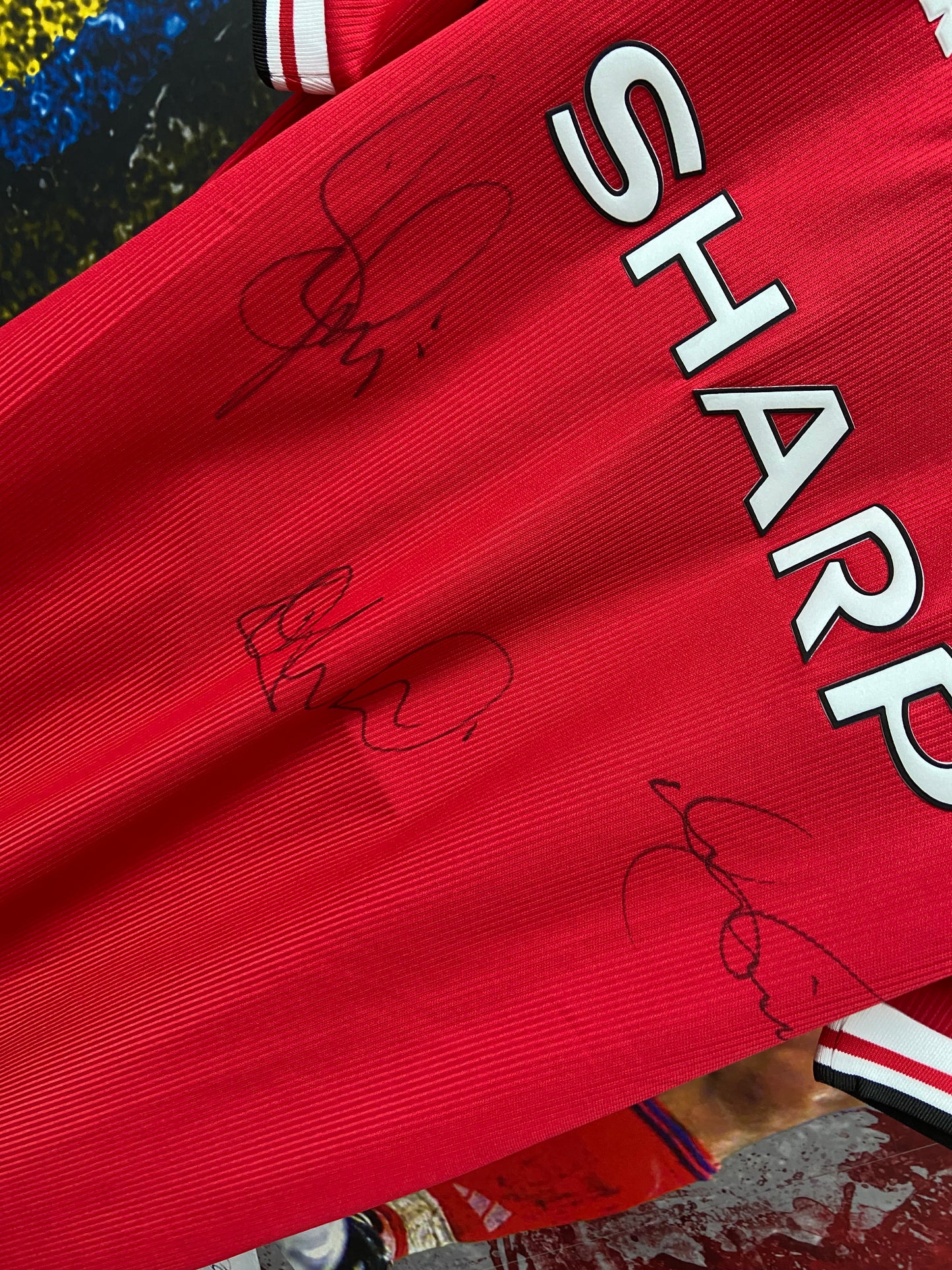 Manchester United 1999 treble winning red home shirt signed by multiple players
